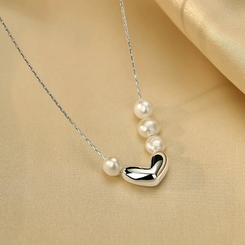 Heart of Pearl – Baroque Pearl & Silver Heart Necklace